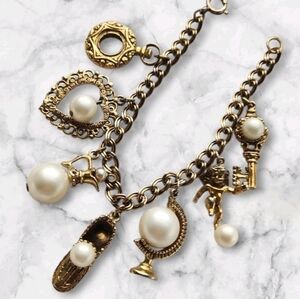 Vintage CIRCO Gold Tone Charm Bracelet Faux Pearl Cherub Key Globe Shoe Charms